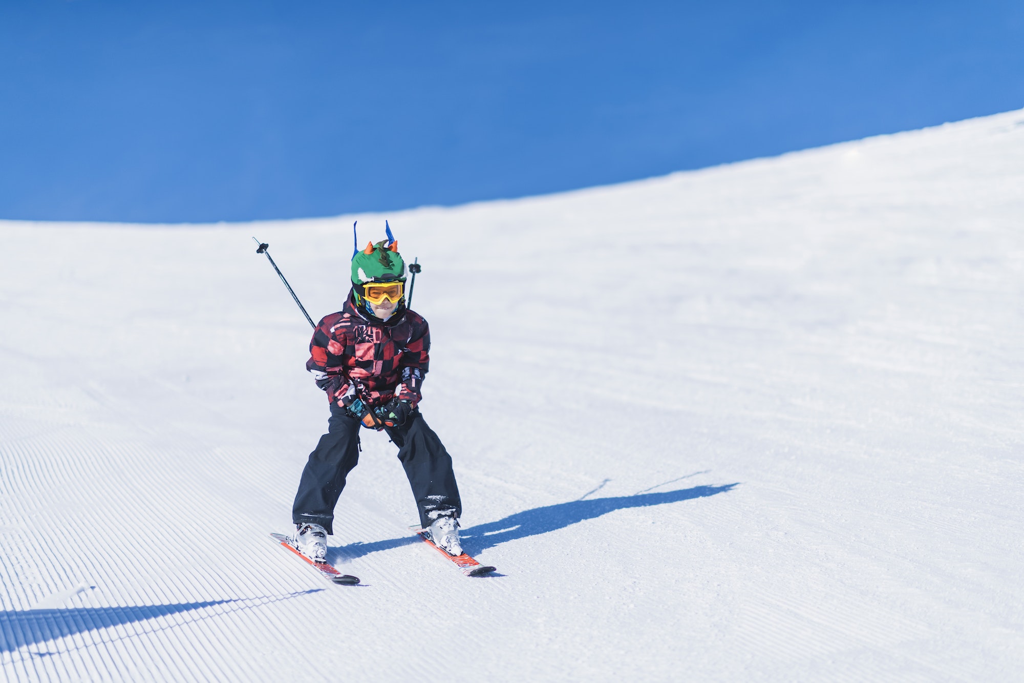 Child Skiing in the Mountains